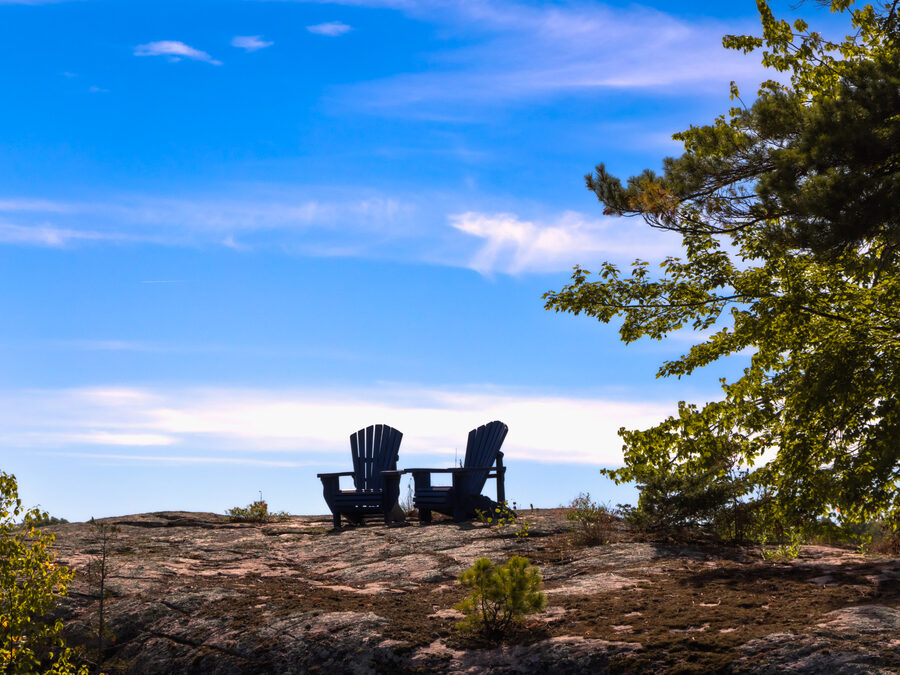 A quiet rocky point overlooking the lake at dusk